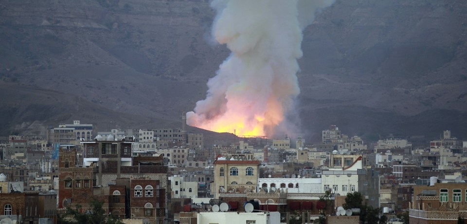 Smoke billows following an air-strike by Saudi-led coalition on May 11, 2015, in the capital Sanaa.