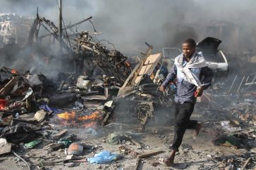 Massive truck bomb that tore through a busy shopping district of Mogadishu, killing and injuring hundreds on Saturday, October 14.