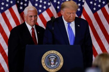 FILE PHOTO: U.S. President Donald Trump and Vice President Mike Pence stand while making remarks about early results from the 2020 U.S. presidential election in the East Room of the White House in Washington, U.S., November 4, 2020. REUTERS/Carlos Barria