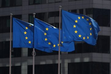 FILE PHOTO: European Union flags fly outside the European Commission headquarters in Brussels, Belgium, April 10, 2019. REUTERS/Yves Herman