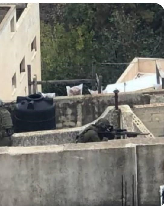 Zionist occupation forces besieging the house of the Palestinian young man Abboud Harazallah in Jenin