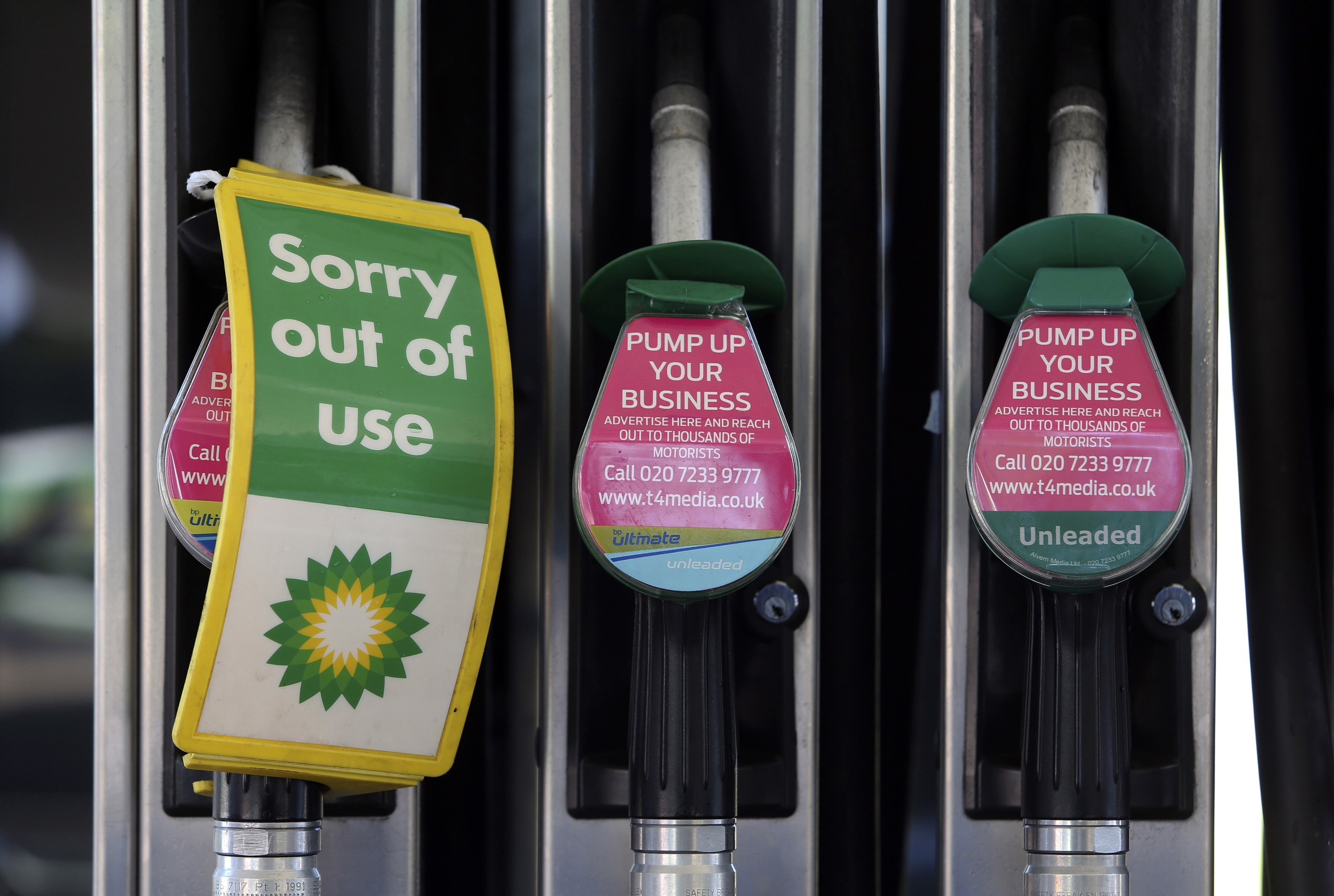 A 'Sorry, out of use' sign sits on a diesel fuel pump at a gas station operated by BP Plc in London, U.K., on Tuesday, June 4, 2013. Royal Dutch Shell Plc, BP Plc, Statoil ASA and Platts, the oil-price data collector owned by McGraw Hill Financial Inc., said they're being investigated after the European Commission conducted raids in three countries to ferret out evidence of collusion. Photographer: Chris Ratcliffe/Bloomberg