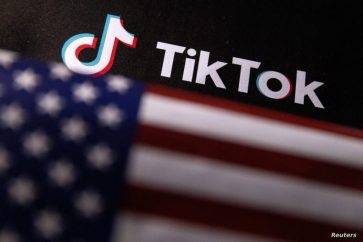 FILE PHOTO: U.S. flag and TikTok logo are seen in this illustration taken, June 2, 2023. REUTERS/Dado Ruvic/Illustration/File Photo