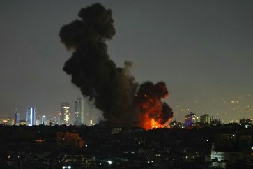 Smoke rises from the site of an Israeli airstrike that targeted a residential complex in the Laylaki neighborhood in Beirut's southern suburbs on October 23, 2024. (Photo by AFP)